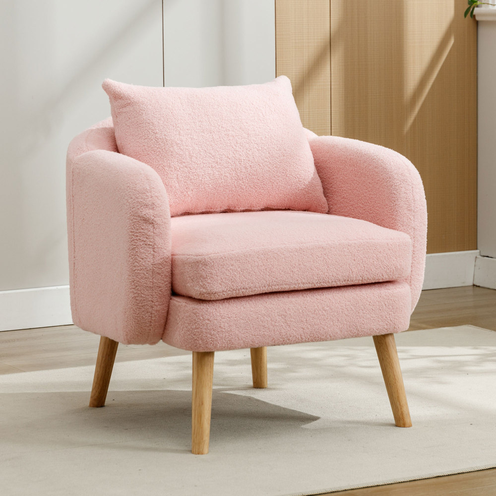 Poltrona em tecido teddy rosa com almofada e pés em madeira