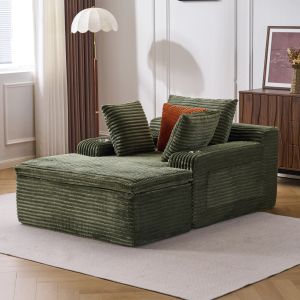 Sofá de chão com chaise longue em bombazina verde com almofadas